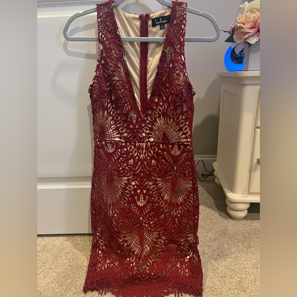 Red lace dress, with plunge neck. Homecoming or formal event, super pretty.
